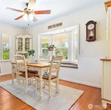 Dining room area w/wainscotting, bay window & lots of natural light
