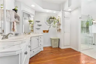 Huge main floor bathroom right next to owner's suite. Tons of cabinets, original floors