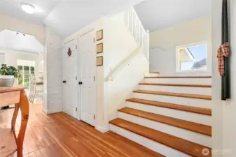 Look at that extra wide staircase! Love the peek-a-boo windows half-way up