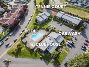Clubhouse with outdoor pool, laundry room, fitness center, rec room, tennis court, and car wash station