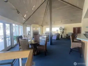 Upstairs Clubhouse includes comfortable furniture, fireplace and kitchen.
