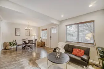 Beautiful updated open living room and dining area are great for entertaining.
