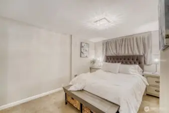 The primary bedroom offers quiet sanctuary for even teh lightest sleeper.