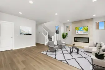 All photos are for representational purposes only. Actual finishes and colors will vary. Spacious living area with the cozy full height electric fireplace. Virtually staged.