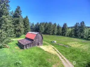 On the lower property there is a barn and small house.