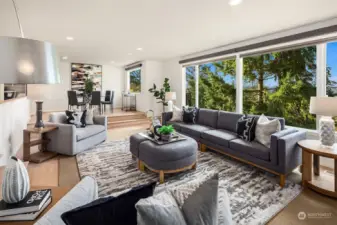 Live large in this wonderful space. Another shot of the gracious living room area shwoing the dining room in the background.