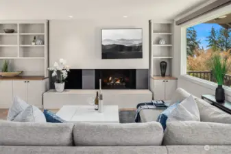 Sleek infinity gas fireplace serves as a focal point for this fabulous family room.