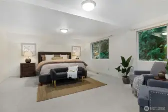 Master Bedroom on the main level with room for additional seating area