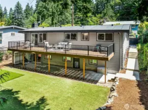 Look at all the space! In addition to a new roof, the home features updated, high-quality Milgard windows throughout, enhancing energy efficiency and reducing interior noise.
