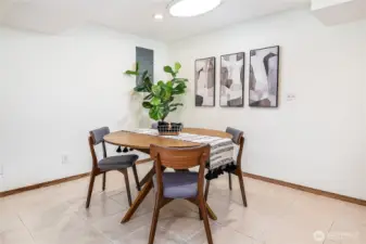 Downstairs eating area next to the kitchen. The overhead light is dimmable with a night light function.
