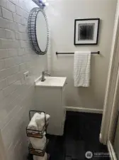 Freshly tiled bathroom downstairs