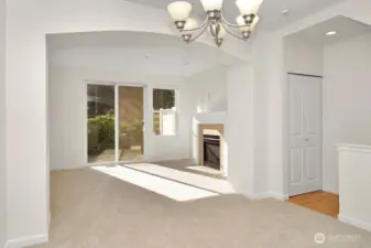 Sliding glass door leads to private patio & lawn