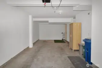spacious garage with storage area, charging station