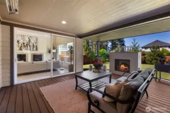 Your dream covered outdoor space With trex decking, built in outdoor heaters for year round use, gas fireplace , Plumed for full outdoor kitchen install, hot tub with motorized cover. This is a year round vacation space!