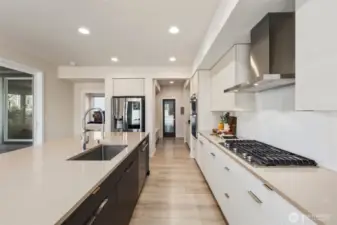 An entertainers or chef's dream kitchen with so much extra storage, a butler pantry, built in mud room and a walk in oversized pantry.