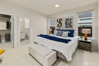 Main floor primary suite, perfect for guests or multigenerational living built in designer closets with LED lights