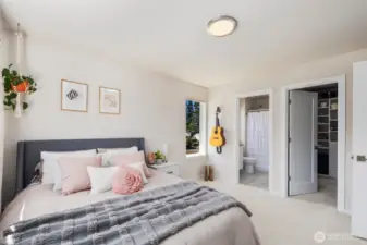 Oversized Bedroom with full bath and built in designer closets with LED lights