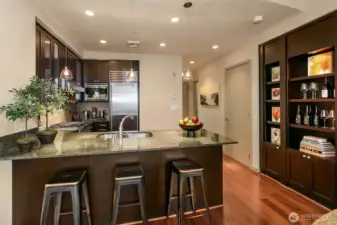 Kitchen is high end and equipped for luxury living. Additional storage for wine/books/curious extend the kitchen capacity.
