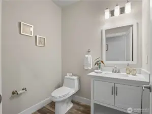 The hall bath on the main floor is readily available when your guests need privacy.