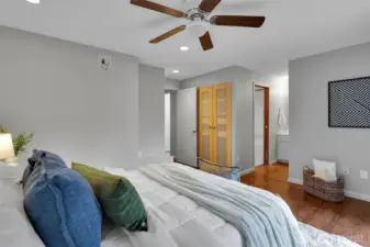 A bright bedroom with natural light and plenty of space.