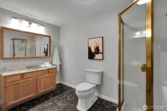A spacious bathroom with plenty of room for daily routines.