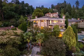 Incredible mature landscaped yard offers a variety of curated spaces to relax, dine, or play while soaking in the panoramic vistas. Professionally maintained throughout!