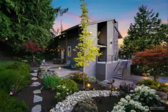 Lush, manicuring grounds & custom hardscape