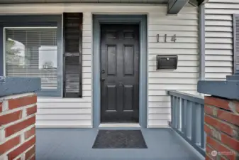 Newly painted door/shutters/front porch.