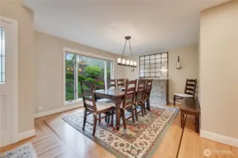 Formal dining room with ribbon inlaid hardwoods