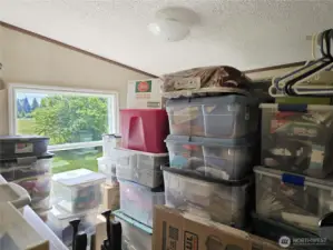 The bedrooms are currently being used to store the seller's personal items that are packed and ready to move