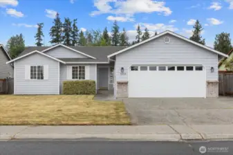 Large lot, fully fenced, oversized garage