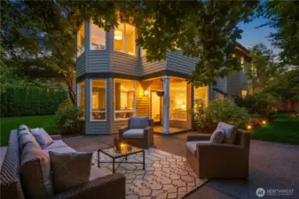 Step outside to a garden where serenity meets vibrant life. Large outdoor patio with relaxing water feature makes for great indoor/outdoor living for any occasion.