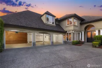 Expansive 3 Car Garage with extra storage.