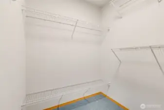Great storage space in the primary bedroom closet.
