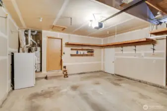 A large two-car garage is attached to the home.