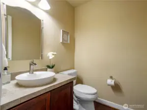 Powder bathroom on the main level for guests.