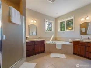 Create your own spa retreat in this luxurious 5-pc bathroom, with jetted tub and generous shower with dual shower heads and individual vanities.