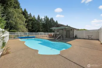 Relax by the in-ground pool, complemented by a poolside changing room and bathroom.”