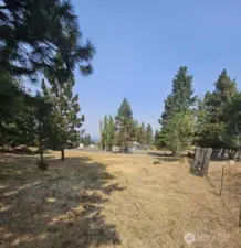 Nearly level w/slight slope, ready to build with water on the lot and electricity in the street