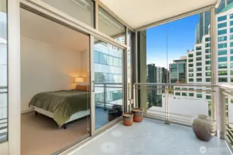 Large covered deck with dual access points from the bedroom and living room.