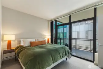 Floor to ceiling window wall with convenient deck access invites fresh air enjoyment.