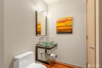 Convenient half bath for guests.