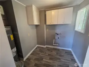 Upstairs laundry room with W/D hook-ups