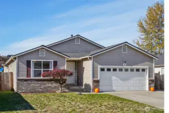 Charming home with great street appeal and RV parking behind the fence.