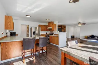 Spacious kitchen with new flooring, breakfast bar and all appliances included.