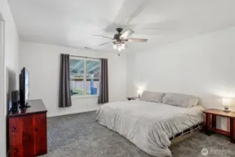 Primary bedroom offers privacy and a large walk-in closet (not pictured)