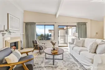 Light filled living room with territorial & mountain views