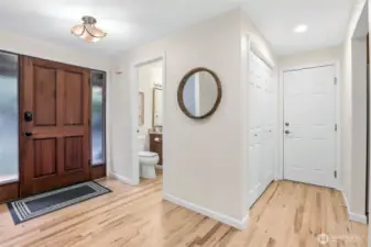 Main floor entry shows the beautiful, recently refinished hardwoods.
