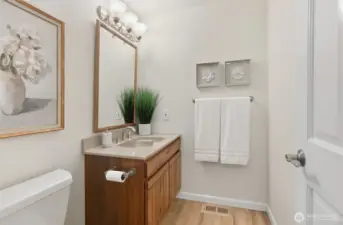 Powder bathroom on the main floor right by the front door.