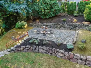 If you desire more yard space, just remove the paver patio and replace with grass.  It's perfectly flat.